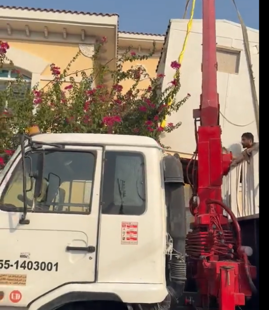 Boom Truck Rental Service in Al Quoz, Dubai - Kamran Crane Services